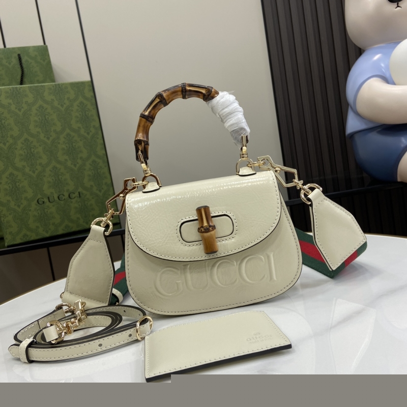 G*u*i top handle bags